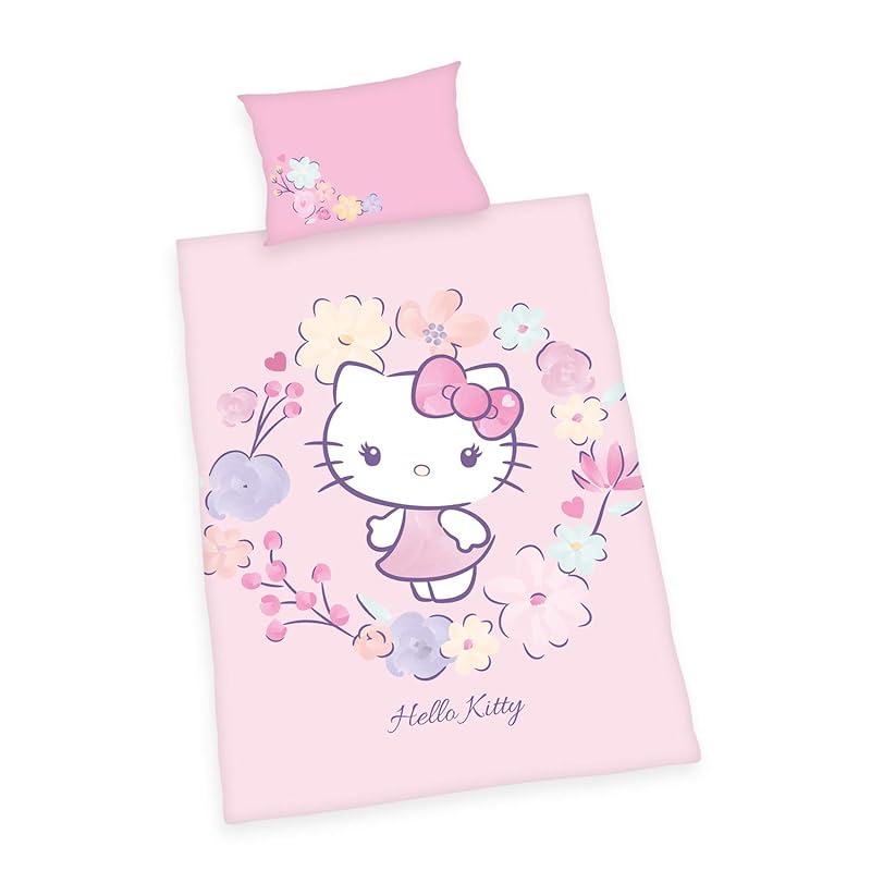 Herding Hello Kitty Bio-Bettwäsche-Set, GOTS-zertifiziert, Wendemotiv, Kopfkissenbezug 40 x 60 cm mit Hoteleinschlag, Bettbezug 100 x 135 cm mit leichtläufigem Reißverschluss, Baumwolle/Renforcé